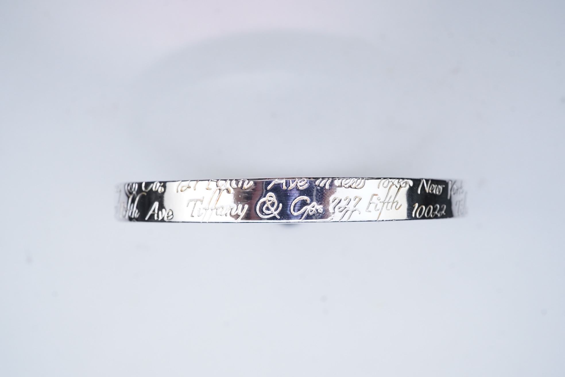 A Tiffany style silver bracelet with box